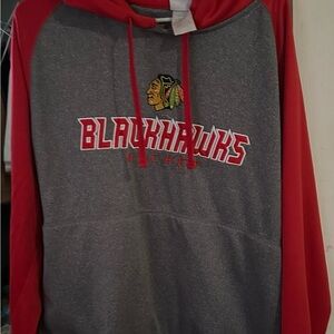 Men's Chicago Blackhawks pullover hoodie, officially licensed by the NHL.